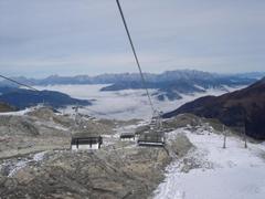 Zell am See pod chmurami, widok z Kitzsteinhorn